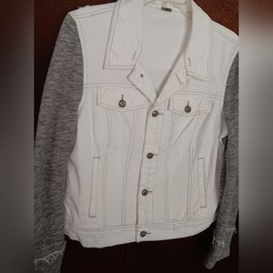 Free People White distressed denim jacket w gray French terry sleeves.